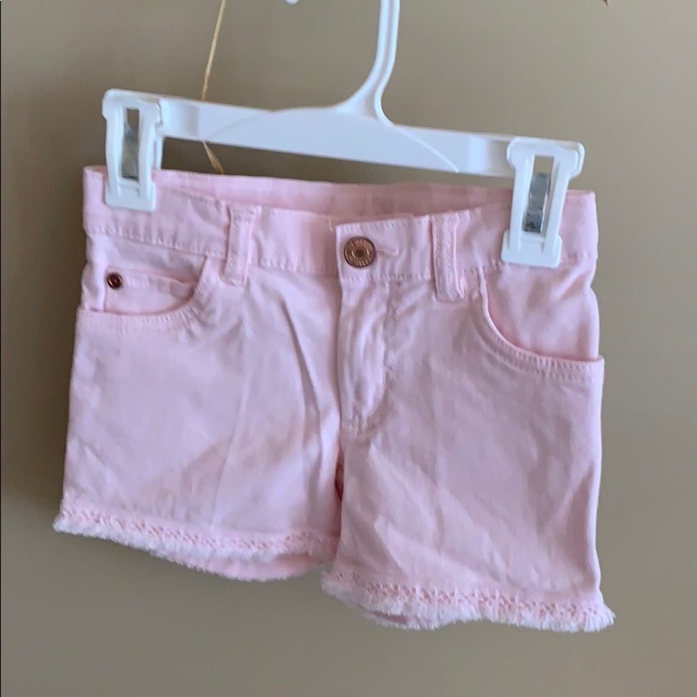 Pink girls shorts with fringe hem